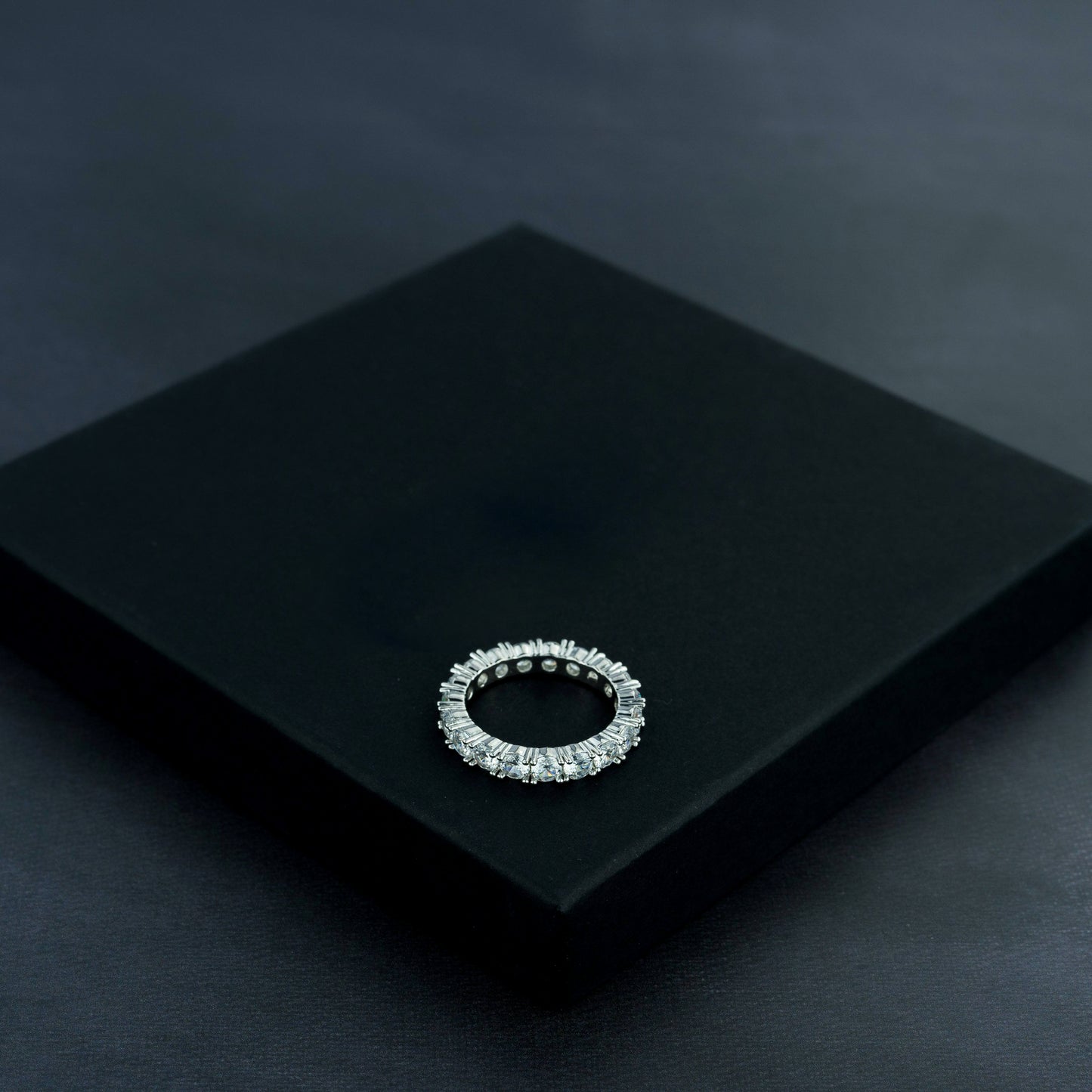 One Row Solitaire Ring